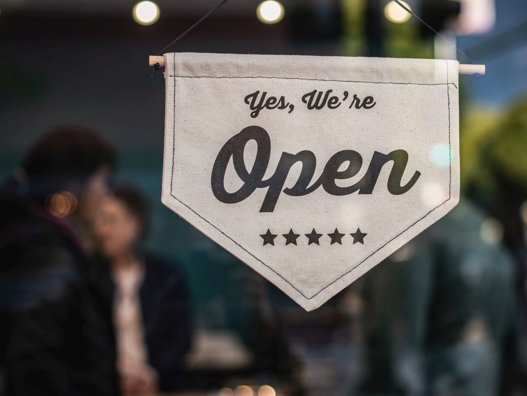 Shop sign reading "open"